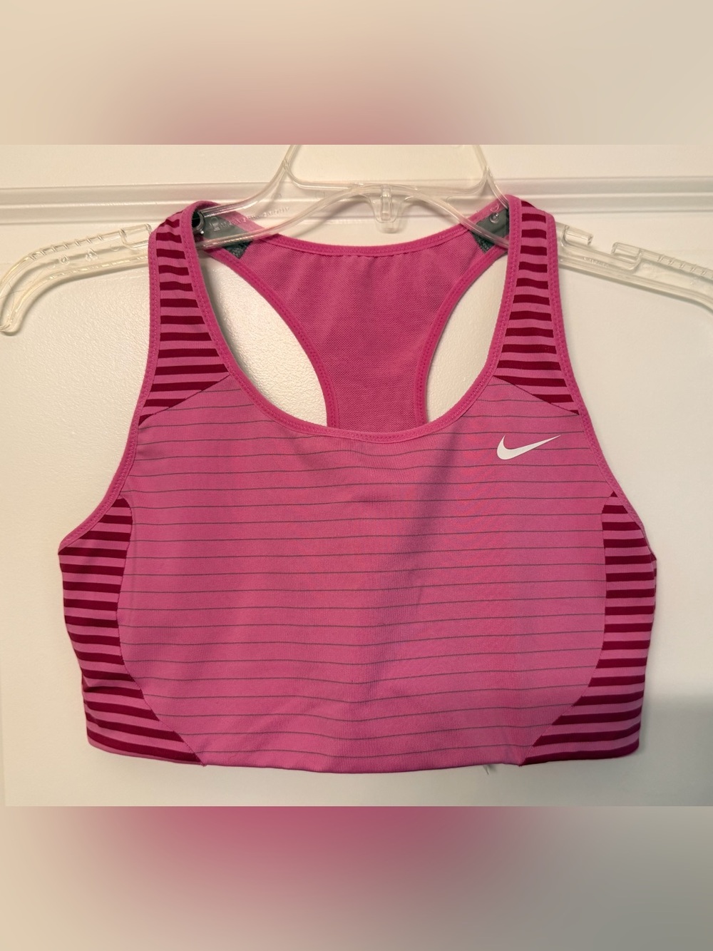 Nike Pink Striped Racerback Sports Bra with White Swoosh and Strong Cup Support